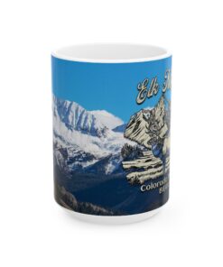 a mug with a picture of mountains and snow