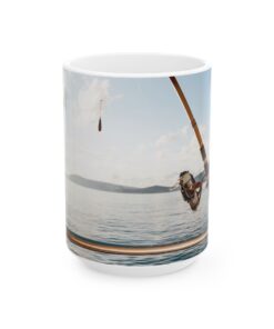 a mug with a picture of a man fishing on it