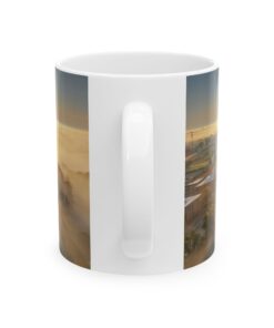 a white mug with a picture of a city