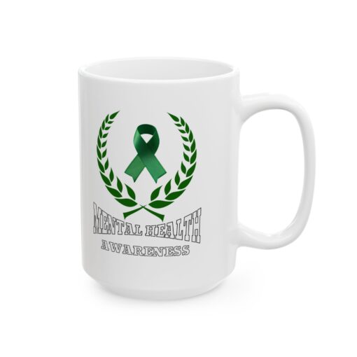 White ceramic mug with a green ribbon, laurel wreath, and the text "Mental Health Awareness."