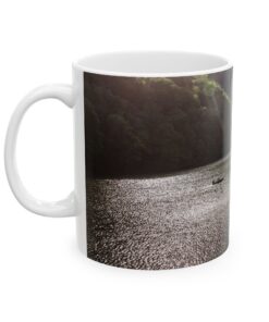 coffee mug with an image of a lake and trees