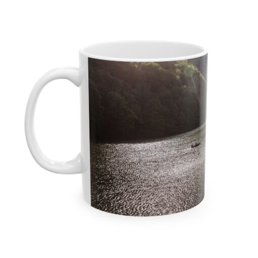 coffee mug with an image of a lake and trees