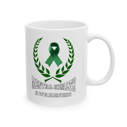 White ceramic mug with a green ribbon, laurel wreath, and the text "Mental Health Awareness."