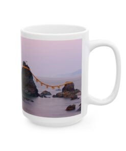 a white coffee mug with a picture of a rock and a rope