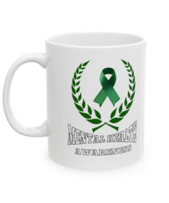 White ceramic mug with a green ribbon, laurel wreath, and the text 