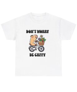 a white t-shirt with a cartoon character riding a bicycle