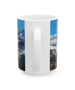 a white mug with a picture of mountains