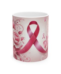 white coffee mug with big pink ribbon on it