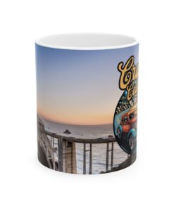 a mug with a picture of a bridge and a car