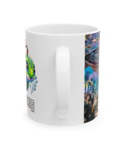 a white mug with a picture of a fish and a sea creature