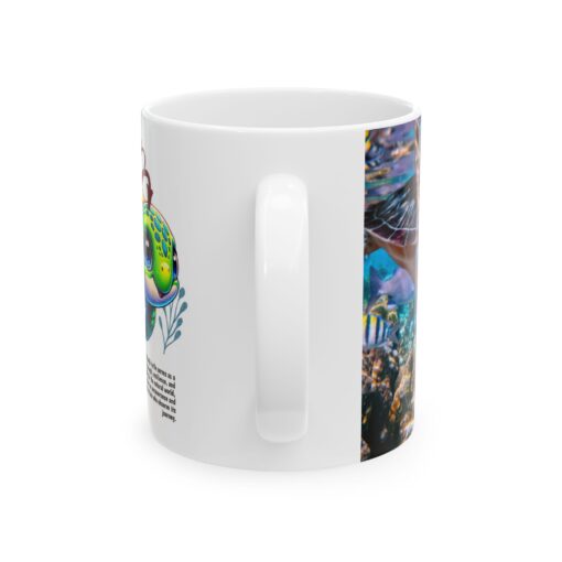 a white mug with a picture of a fish and a sea creature