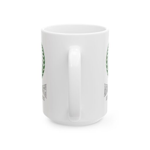 White ceramic mug with a green ribbon, laurel wreath, and the text "Mental Health Awareness."