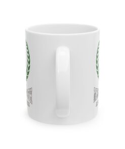 White ceramic mug with a green ribbon, laurel wreath, and the text 