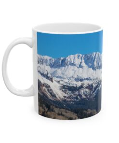 a mug with snowy colorado mountains