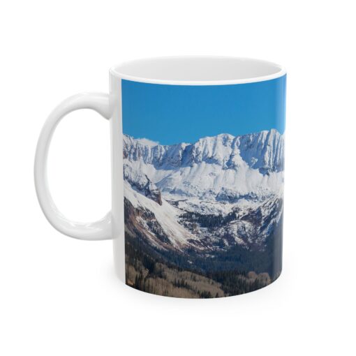 a mug with snowy colorado mountains