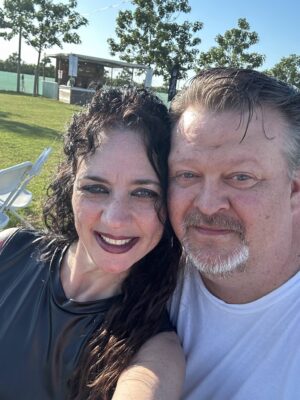 a man and woman taking a selfie