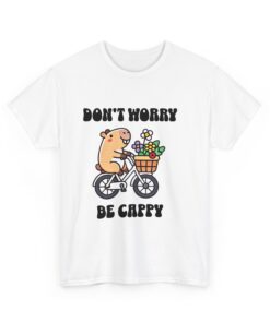 a white t-shirt with a cartoon character riding a bicycle