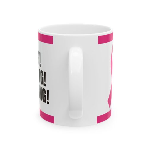 Pink ribbon ceramic mug with floral design, in support of breast cancer awareness