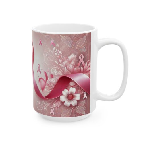 a coffee mug with pink ribbons and flowers