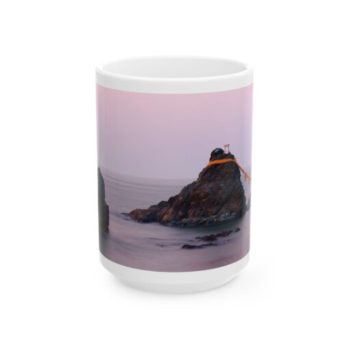 a coffee mug with a picture of a rock on it