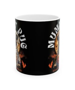 a black coffee mug with a picture of a mummy