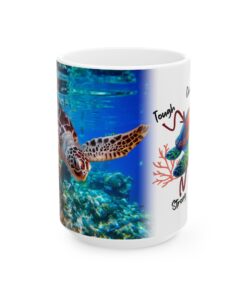 a white mug with a turtle swimming in the water