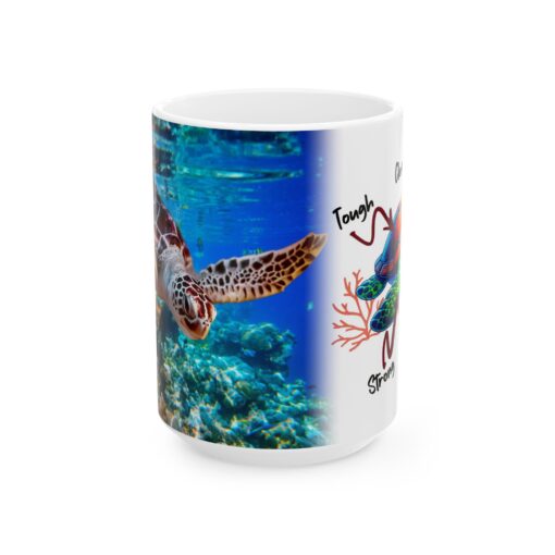 a white mug with a turtle swimming in the water