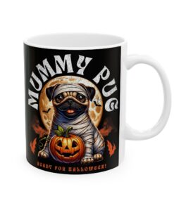 a mug with a picture of a dog and a pumpkin