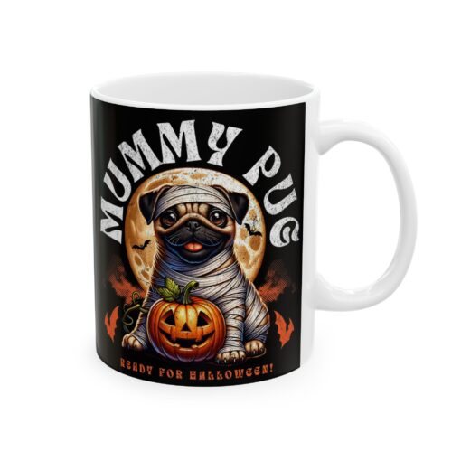 a mug with a picture of a dog and a pumpkin