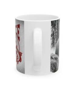 a white coffee mug with a red and black image