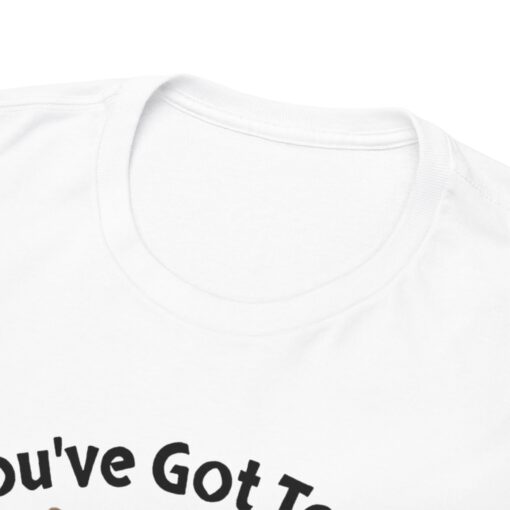 a white shirt with black text