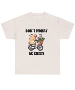 a white t-shirt with a cartoon bear riding a bicycle