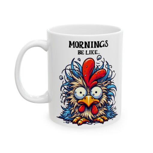 Humorous white ceramic mug depicting a messy chicken with the phrase Mornings Be Like