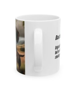 a white mug with a picture of a dog