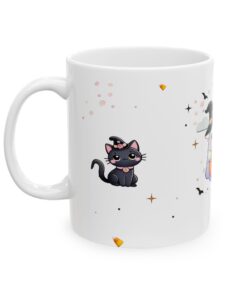 a white mug with cartoon cats on it